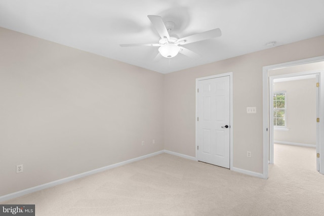 7481 Windswept Ct, Sykesville, MD 21784 - unfurnished bedroom featuring light colored carpet and a ceiling fan