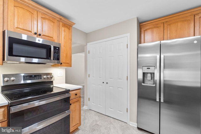 7481 Windswept Ct, Sykesville, MD 21784 - kitchen with stainless steel appliances and light countertops