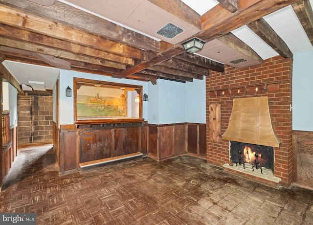 364 Driscoll Ave, Woodbury, NJ 08096 - unfurnished living room with wainscoting, wooden walls, a fireplace, and beam ceiling