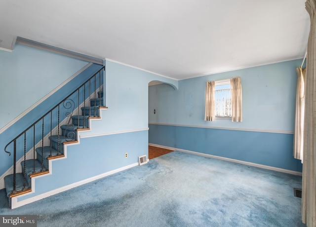364 Driscoll Ave, Woodbury, NJ 08096 - stairway featuring carpet floors, arched walkways, ornamental molding, and baseboards