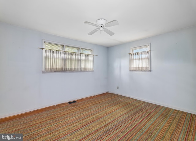 364 Driscoll Ave, Woodbury, NJ 08096 - carpeted empty room featuring ceiling fan and plenty of natural light