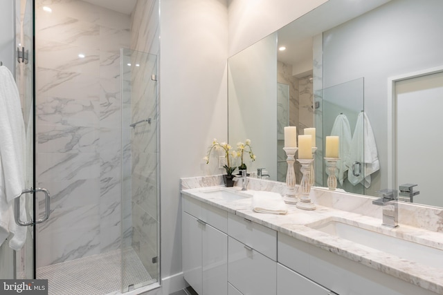 1125 Morse St NE Unit 2, Washington, DC 20002 - full bathroom with a marble finish shower, double vanity, and recessed lighting