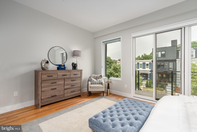 1125 Morse St NE Unit 2, Washington, DC 20002 - bedroom featuring access to outside, light wood finished floors, and baseboards