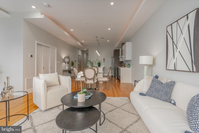 1125 Morse St NE Unit 2, Washington, DC 20002 - living area featuring light wood-type flooring and recessed lighting