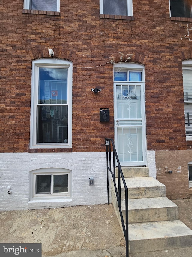 708 N Glover St, Baltimore, MD 21205 - view of exterior entry featuring brick siding