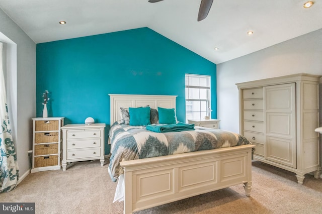 bedroom with vaulted ceiling, light colored carpet, a ceiling fan, and recessed lighting