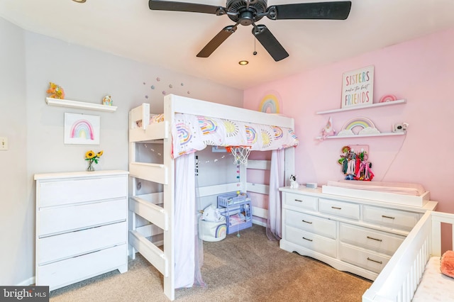 bedroom featuring light carpet and ceiling fan