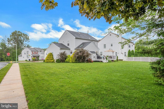 view of yard featuring a residential view