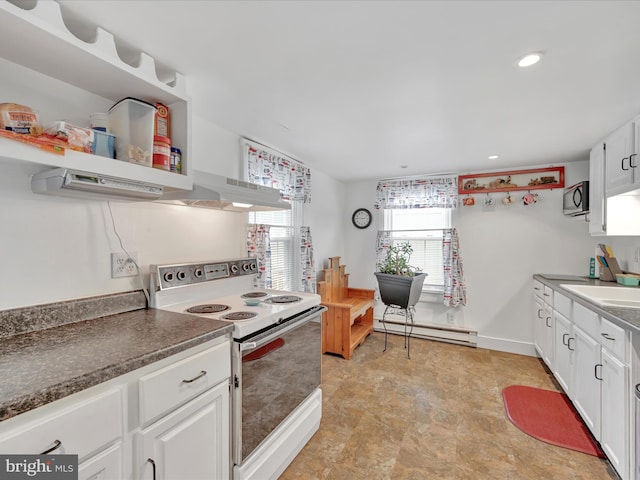 kitchen with white range with electric stovetop, a baseboard radiator, white cabinets, stainless steel microwave, and recessed lighting