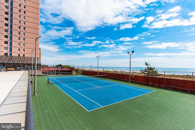 10900 Coastal Hwy Unit 209, Ocean City, MD 21842 - view of tennis court with fence and a water view
