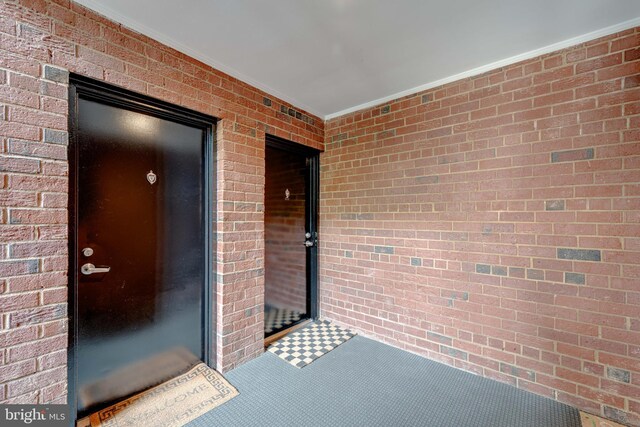 51 Skyhill Rd Unit 202, Alexandria, VA 22314 - view of exterior entry with brick siding