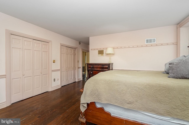 1554 Williams Grove Rd, Mechanicsburg, PA 17055 - bedroom featuring dark wood-style flooring and two closets