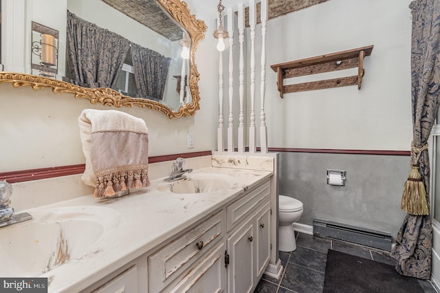 1554 Williams Grove Rd, Mechanicsburg, PA 17055 - bathroom featuring a baseboard radiator, double vanity, toilet, and tile patterned flooring