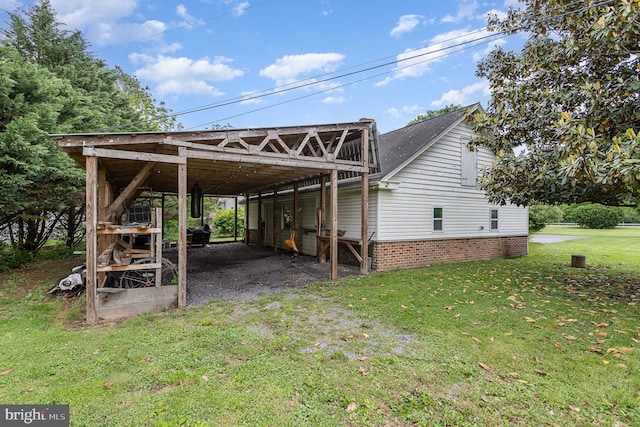 1554 Williams Grove Rd, Mechanicsburg, PA 17055 - exterior space with a lawn, a carport, and roof with shingles