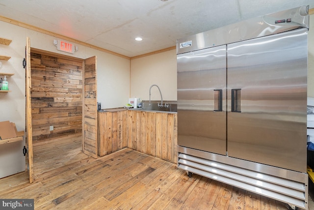 1554 Williams Grove Rd, Mechanicsburg, PA 17055 - kitchen with built in fridge, a sink, light wood finished floors, crown molding, and recessed lighting