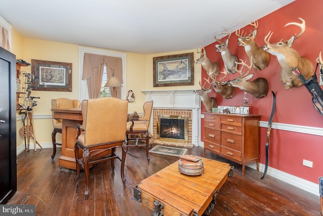 1554 Williams Grove Rd, Mechanicsburg, PA 17055 - living area featuring hardwood / wood-style floors, baseboards, and a brick fireplace