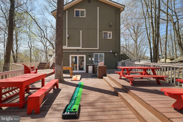 deck featuring stairs