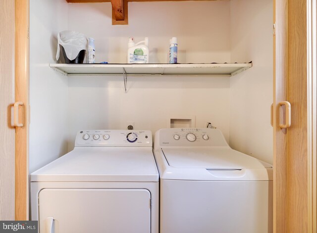 washroom featuring separate washer and dryer