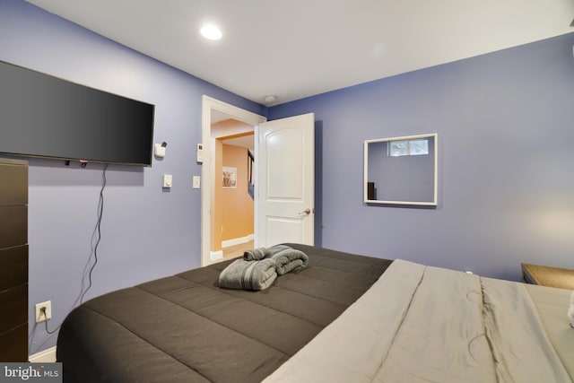 bedroom with baseboards and recessed lighting