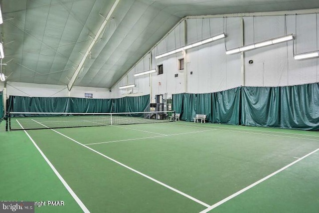 view of tennis court with fence