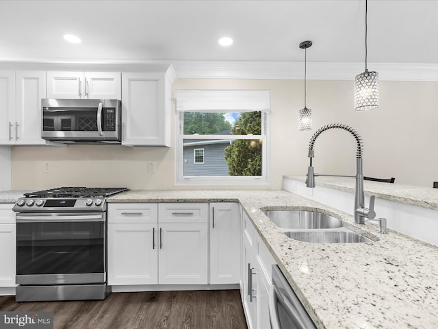 338 Wende Way, Glen Burnie, MD 21061 - kitchen with appliances with stainless steel finishes, a sink, ornamental molding, dark wood-type flooring, and white cabinetry