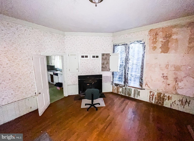22446E Depot St, Newsoms, VA 23874 - unfurnished office featuring crown molding, dark wood-type flooring, and wallpapered walls