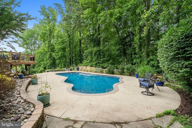 3740 Devin Ct, Huntingtown, MD 20639 - view of pool with a patio area, a wooden deck, and stairs