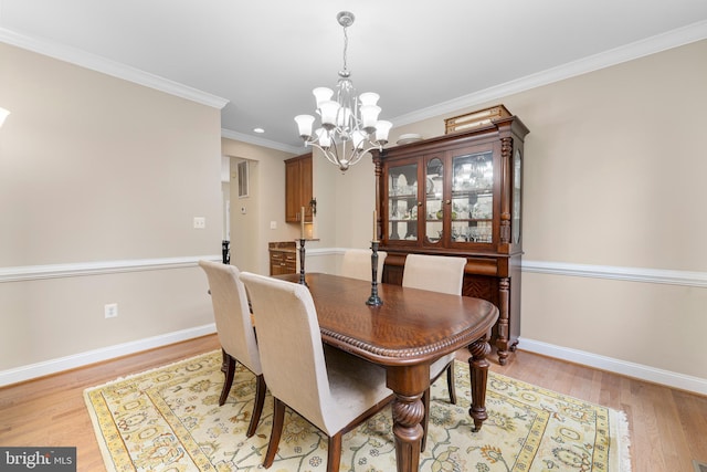 3740 Devin Ct, Huntingtown, MD 20639 - dining space with a chandelier, baseboards, light wood finished floors, and crown molding