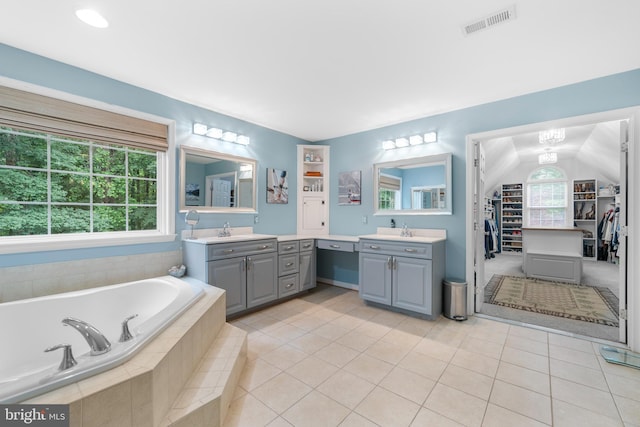 3740 Devin Ct, Huntingtown, MD 20639 - full bathroom with two vanities, a bath, a spacious closet, and tile patterned flooring