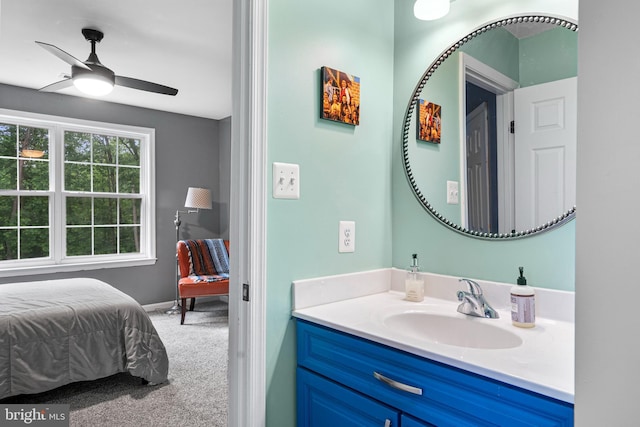 3740 Devin Ct, Huntingtown, MD 20639 - ensuite bathroom with vanity, ceiling fan, and baseboards