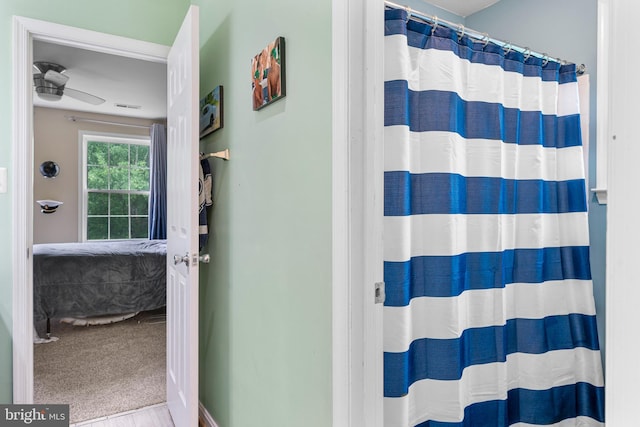 3740 Devin Ct, Huntingtown, MD 20639 - full bath with ensuite bath, ceiling fan, and a shower with shower curtain