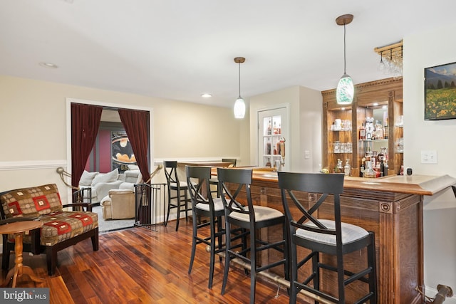 3740 Devin Ct, Huntingtown, MD 20639 - indoor bar with dark wood-style floors and pendant lighting