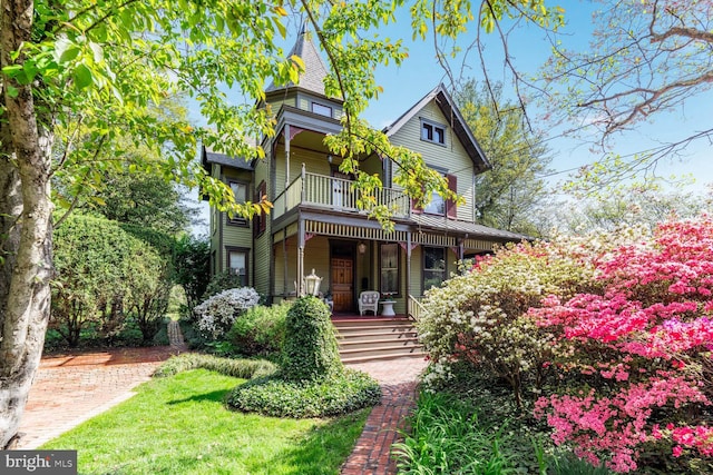 3911 Prospect St, Kensington, MD 20895 - victorian-style house with a balcony and covered porch