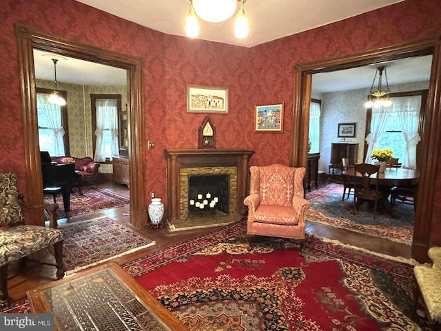 3911 Prospect St, Kensington, MD 20895 - sitting room featuring a chandelier and wallpapered walls