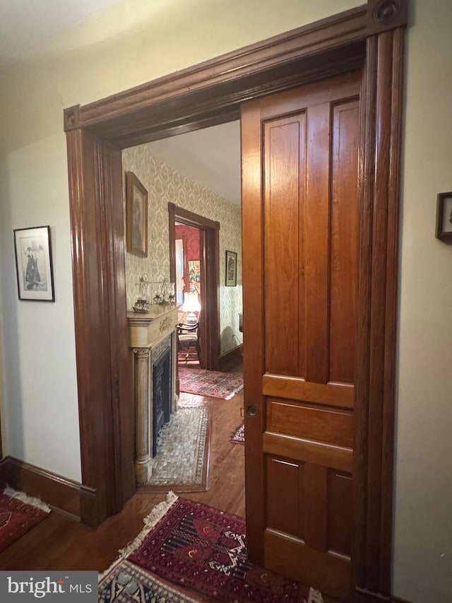 3911 Prospect St, Kensington, MD 20895 - hallway featuring wood finished floors and wallpapered walls