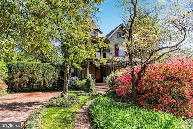 3911 Prospect St, Kensington, MD 20895 - victorian-style house featuring covered porch and a balcony