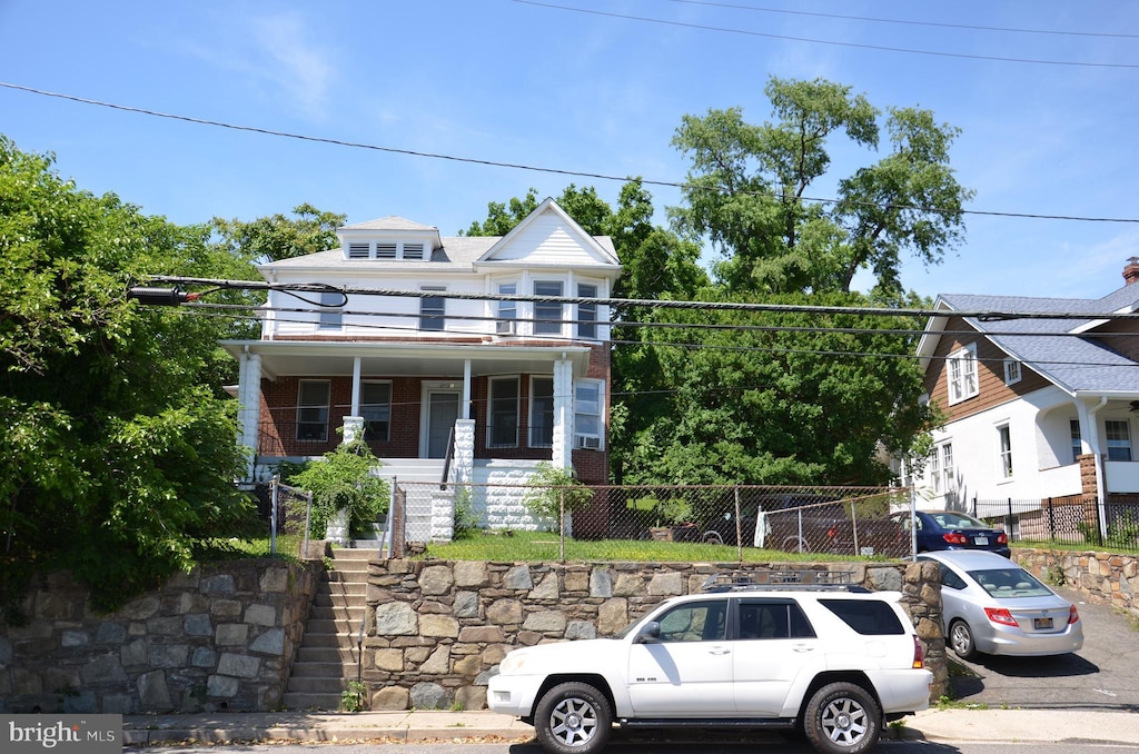 2713 24th Rd S Unit B, Arlington, VA 22206 - american foursquare style home featuring a fenced front yard and covered porch