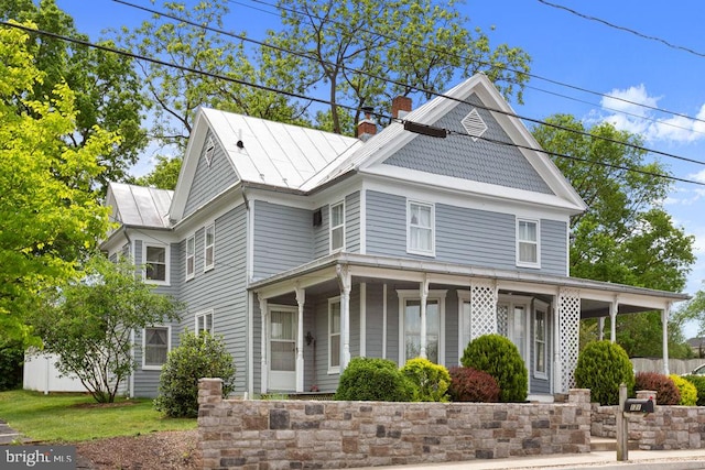 121 S Central St, Broadway, VA 22815 - view of front facade featuring a chimney and a porch