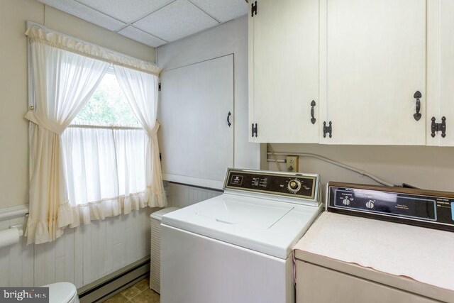 121 S Central St, Broadway, VA 22815 - clothes washing area featuring baseboard heating and washing machine and dryer