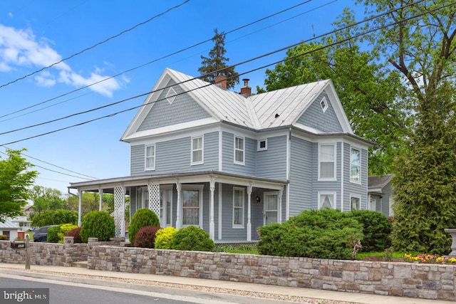 121 S Central St, Broadway, VA 22815 - victorian-style house featuring a porch and a chimney
