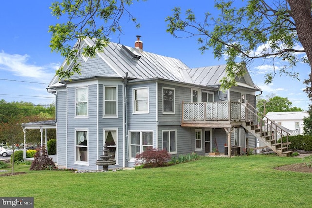 121 S Central St, Broadway, VA 22815 - back of property featuring a standing seam roof, a chimney, a lawn, and metal roof