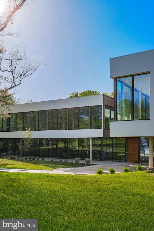 surrounding community with a lawn
