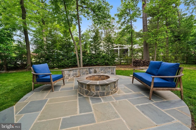 2125 Rampart Dr, Alexandria, VA 22308 - view of patio with an outdoor fire pit