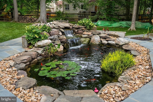 2125 Rampart Dr, Alexandria, VA 22308 - view of yard with a garden pond
