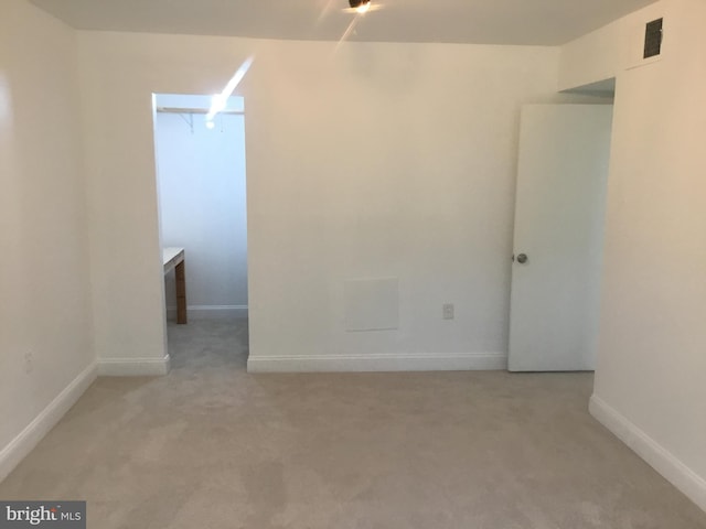 9449 Fairfax Blvd Unit 301, Fairfax, VA 22031 - carpeted spare room featuring baseboards