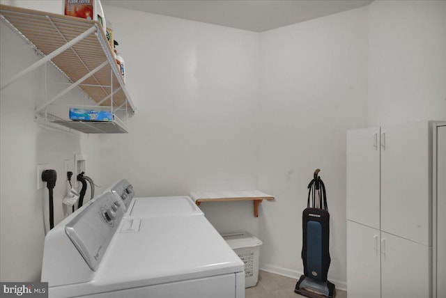 4304 Wheelwright Trl, Downingtown, PA 19335 - washroom with separate washer and dryer, cabinet space, and baseboards