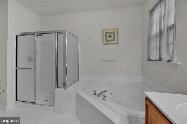4304 Wheelwright Trl, Downingtown, PA 19335 - bathroom with a stall shower, a jetted tub, vanity, and tile patterned flooring