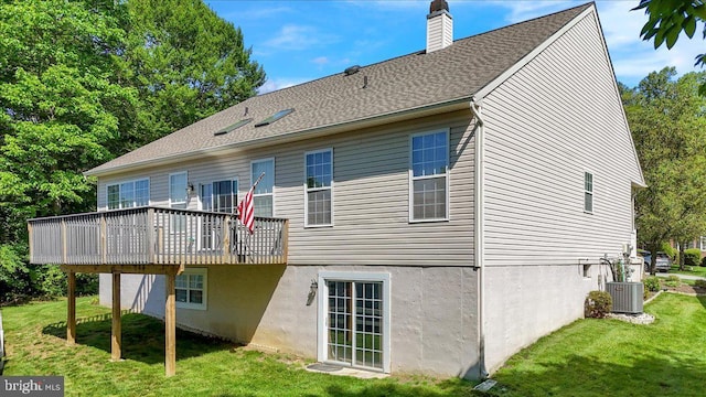 4304 Wheelwright Trl, Downingtown, PA 19335 - back of property featuring a yard, a chimney, central air condition unit, and a wooden deck