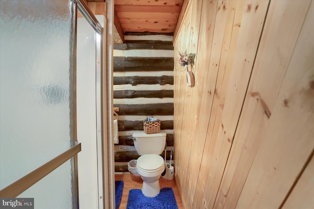 10263 Licking Creek Rd, Mifflintown, PA 17059 - bathroom with toilet, wood finished floors, wood walls, and wood ceiling