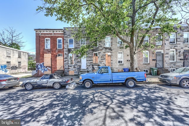 1827 Eagle St, Baltimore, MD 21223 - view of property featuring stone siding